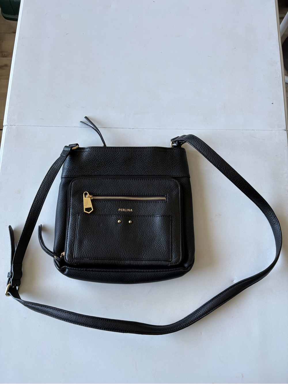 Perlina Black Pebbled Crossbody Bag with Front Zip Pocket